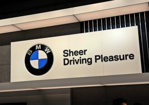 The tagline "Sheer Driving Pleasure" is seen engraved on one of the walls of BMW's corporate office.